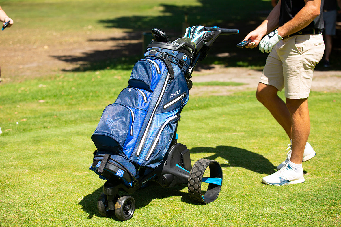 Walking the course with an MGI Electric golf push cart